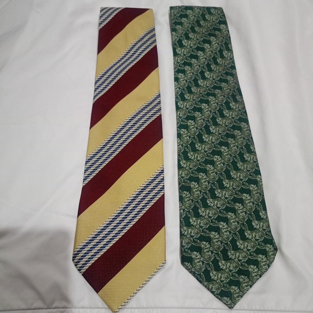 Men's Necktie 2pcs avail- Striped Formal Office Tie Bundle - (Category: Ties) located in Taguig. Submitted by thriftedfound_finds (Listing ID 1465820499, Image 1). Description: Onhand item & ready to ship 150 each (2 for 150) - Brand: Be-Most by Felissimo Men's Planning Division - Quantity: Set of 2 ties - Designs: Bold yellow/red/blue stripes & rich green with subtle rabbit motif - Details: Official brand label stitched on the back - Fit: Classi