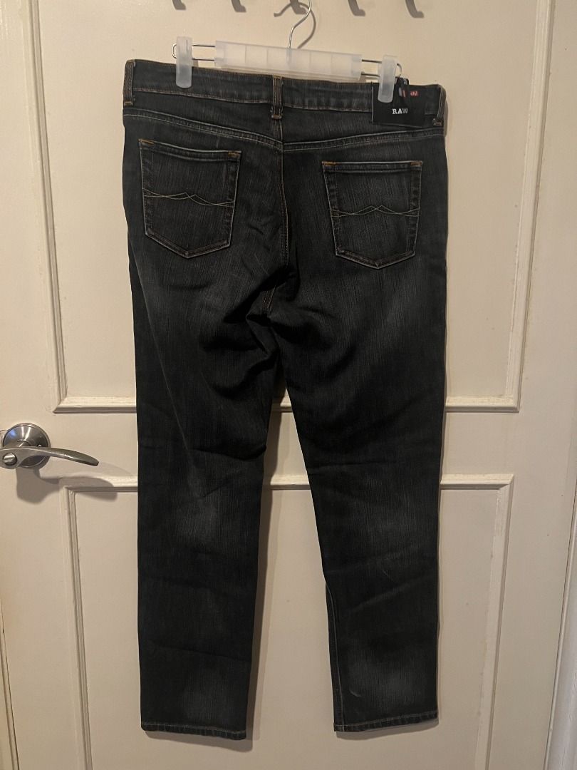 Bench Raw Dark Wash Denim Jeans [p7] (Category: Jeans) located in Pasig City. Submitted by awesamfinds (Listing ID 1465834898, Image 2). Description: - Brand: Bench Raw - Style: Classic straight cut with button and zip fly - Wash: Dark wash with a subtle fade effect down the legs - Details: Standard five-pocket layout, contrast stitching, and branded black leather patch - Condition: Excellent, ready to wear - Perfect for: Casual everyday styling 