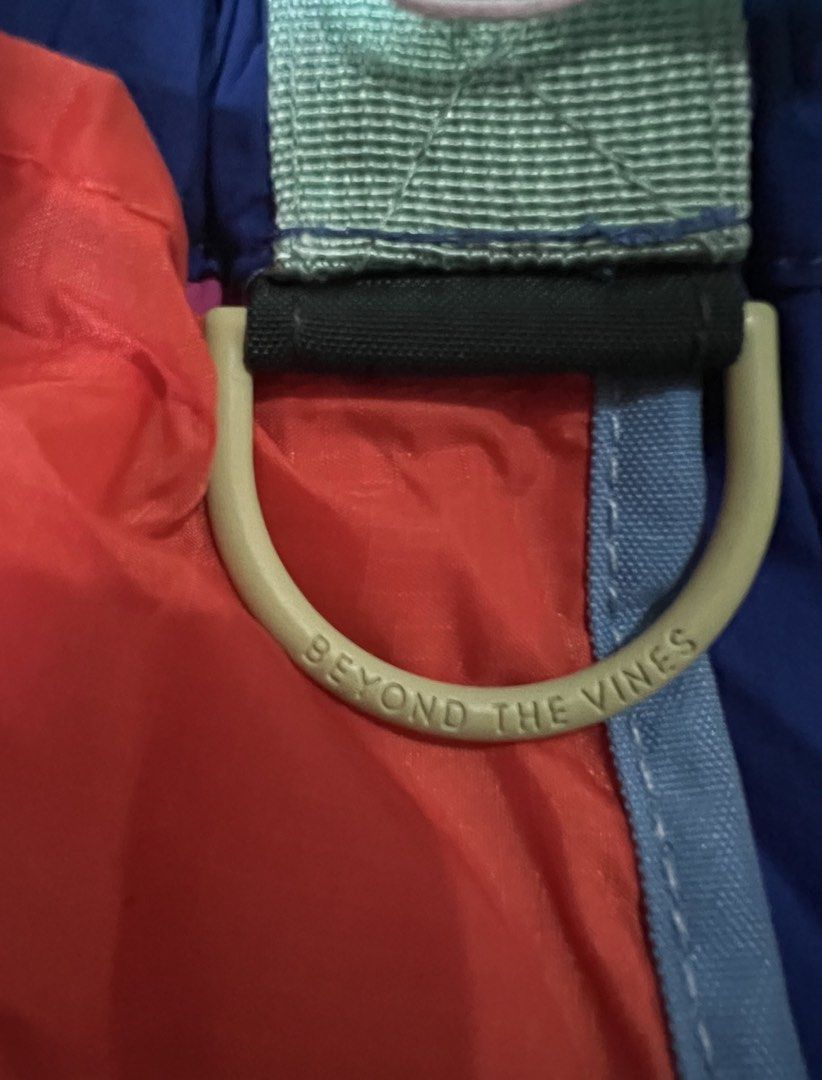 Beyond The Vines Super Panelled XS Dumpling bag (Category: Cross-body Bags) located in Las Pinas. Submitted by silver_mamadeclutters (Listing ID 1465931672, Image 3). Description: - Brand: Beyond The Vines - Condition: Brand new with hang tags and interior tag attached - Material: 100% durable nylon - Design: Vibrant colorblock in blue, red, neon yellow mesh, and mint green - Pockets & Details: Orange front pocket with white text logo - Strap: Ad