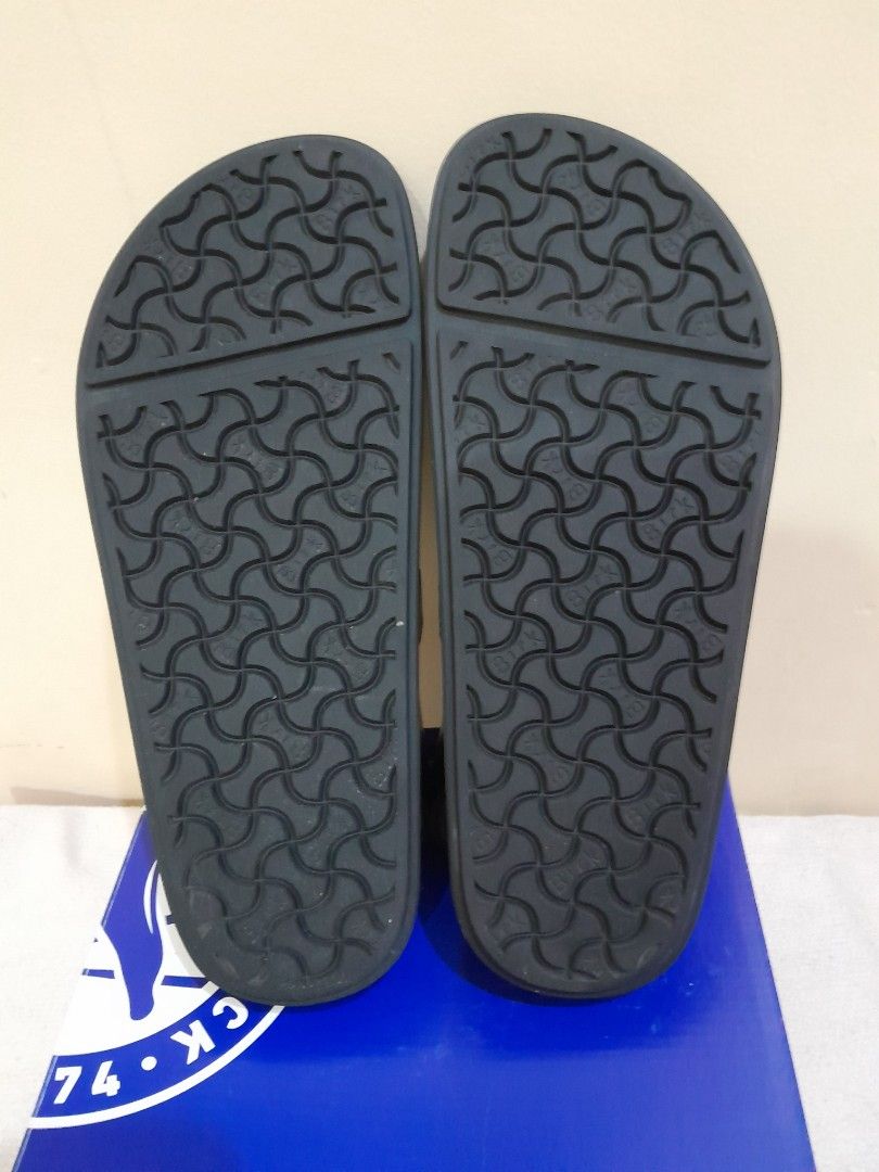 Birkenstock Cannes (Category: Flats & Sandals) located in Manila. Submitted by spicykick (Listing ID 1465841445, Image 3). Description: - Brand: Birkenstock - Style: Black leather sandals with back strap and metal buckles - Size: 37 eu - Origin: Made in Germany - Sole: Thick rubber lug sole with classic bone tread - Inclusion: Original blue box - Condition: Great find, well-maintained.