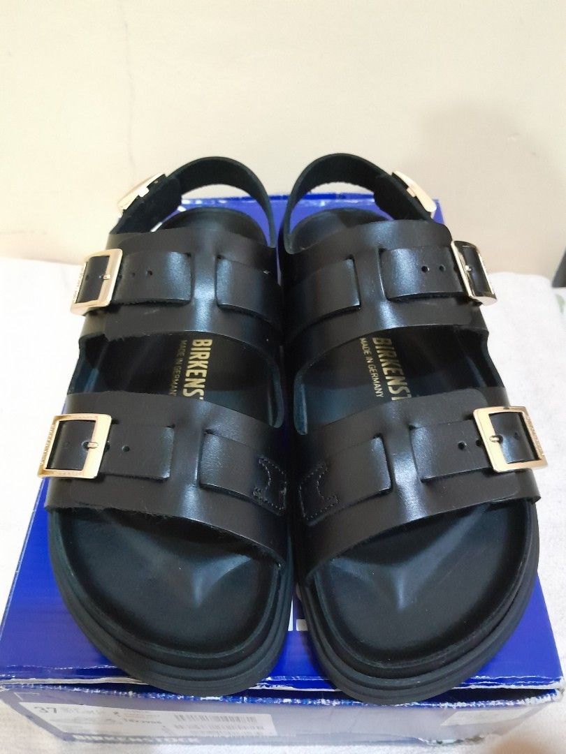 Birkenstock Cannes (Category: Flats & Sandals) located in Manila. Submitted by spicykick (Listing ID 1465841445, Image 1). Description: - Brand: Birkenstock - Style: Black leather sandals with back strap and metal buckles - Size: 37 eu - Origin: Made in Germany - Sole: Thick rubber lug sole with classic bone tread - Inclusion: Original blue box - Condition: Great find, well-maintained.