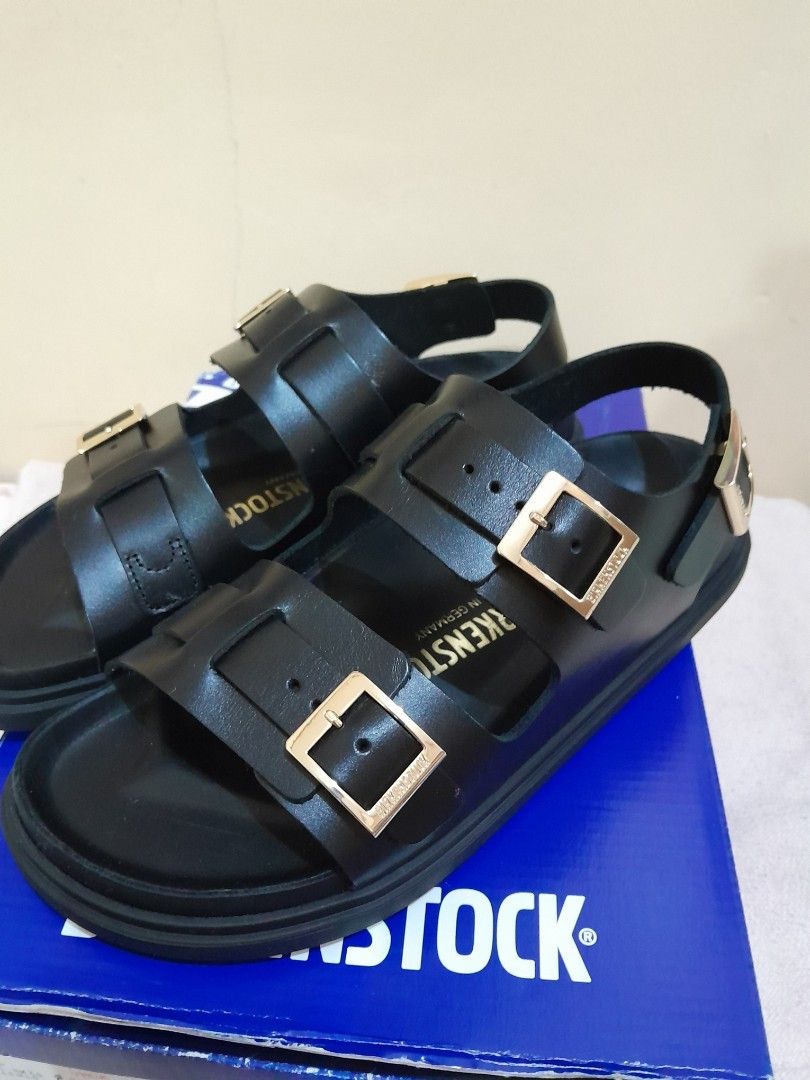 Birkenstock Cannes (Category: Flats & Sandals) located in Manila. Submitted by spicykick (Listing ID 1465841445, Image 2). Description: - Brand: Birkenstock - Style: Black leather sandals with back strap and metal buckles - Size: 37 eu - Origin: Made in Germany - Sole: Thick rubber lug sole with classic bone tread - Inclusion: Original blue box - Condition: Great find, well-maintained.