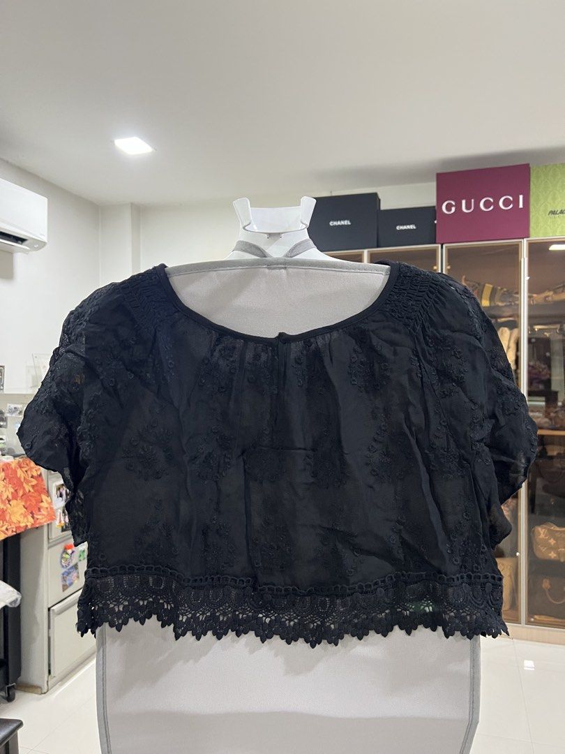 Black Cropped Lace Trim Blouse (Category: Blouses) located in Manila. Submitted by imprincessg888 (Listing ID 1465846700, Image 1). Description: - Color: Black - Style: Short-sleeve crop top with intricate embroidered details - Neckline: Scoop neck with comfortable smocked elastic at the shoulders - Hem: Finished with a sweet decorative lace trim - Fabric: Lightweight and breathable, ideal for high-waisted jeans or skirts - Condition: Clean and r
