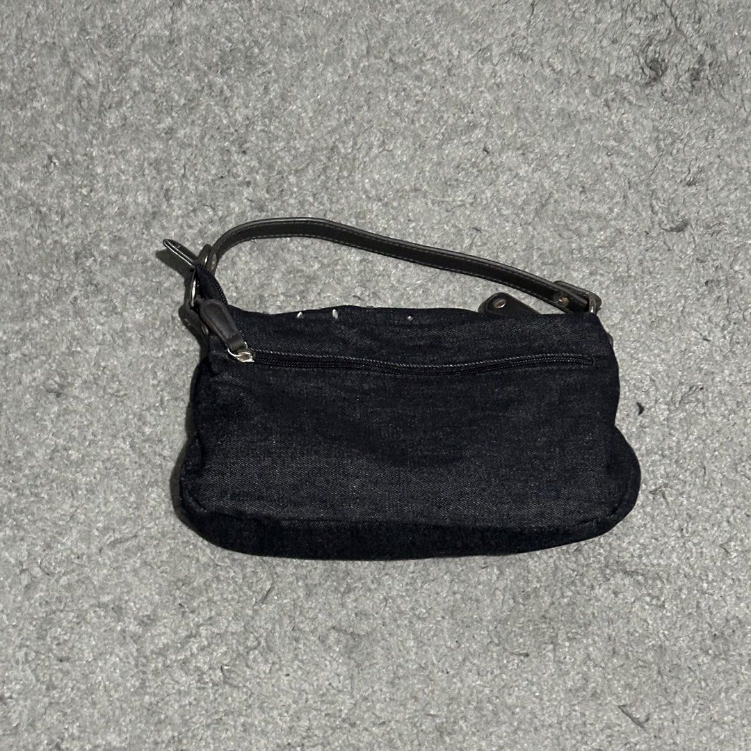 Black Denim Shoulder Bag with Rhinestone Detailing (Category: Shoulder Bags) located in Lipa City. Submitted by jecoparra (Listing ID 1465842082, Image 3). Description: - Style: Black denim shoulder bag with a soft, slouchy design - Detailing: Sparkling rhinestone starburst pattern on the front - Straps & Hardware: Short dark brown strap with sleek silver hardware - Storage: Main compartment for daily essentials plus a full-width back zippered po