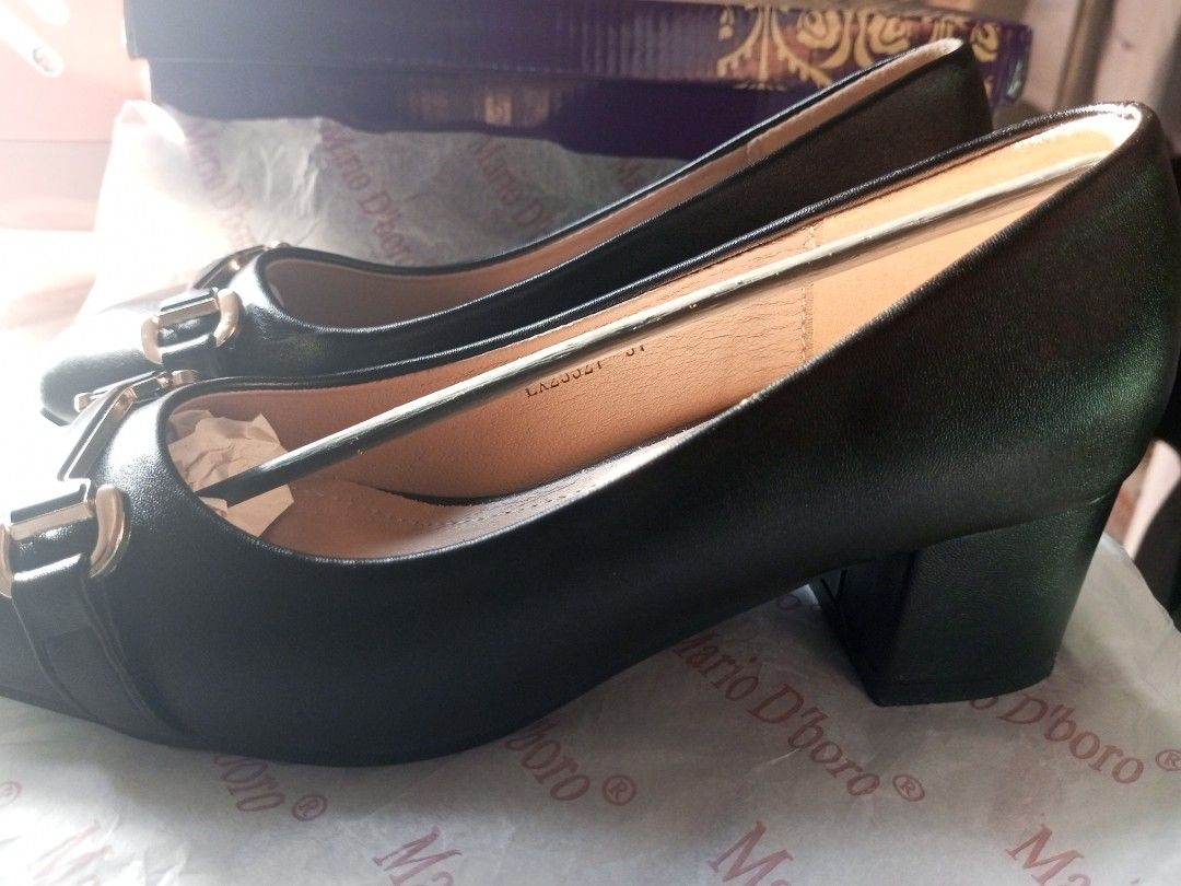 Black Heels from Mario D' Boro (Category: Heels) located in Manila. Submitted by juleszn (Listing ID 1465847095, Image 2). Description: Reason for selling: not my size I only got to use it once. I bought it for 1,800 PHP just this week. It still comes with its full packaging. There's a slight scratch on the side so the price can still be negotiable..