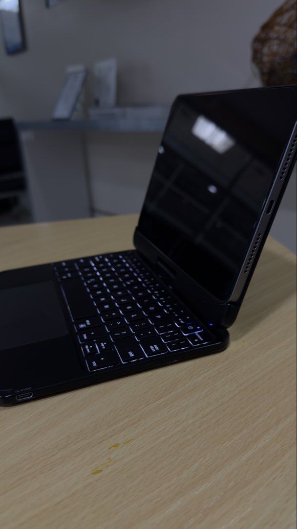 Black iPad Mini Keyboard Case with Trackpad (Category: Cases & Sleeves) located in Manila. Submitted by czarinaflores (Listing ID 1465946435, Image 3). Description: Model: Black Magnetic iPad Mini keyboard case Features: Built-in trackpad, white keys in standard layout, Bluetooth connectivity Condition: Fully functional, with some surface scratches and wear marks on the exterior shell from daily carrying Inclusions: Comes with the original box an