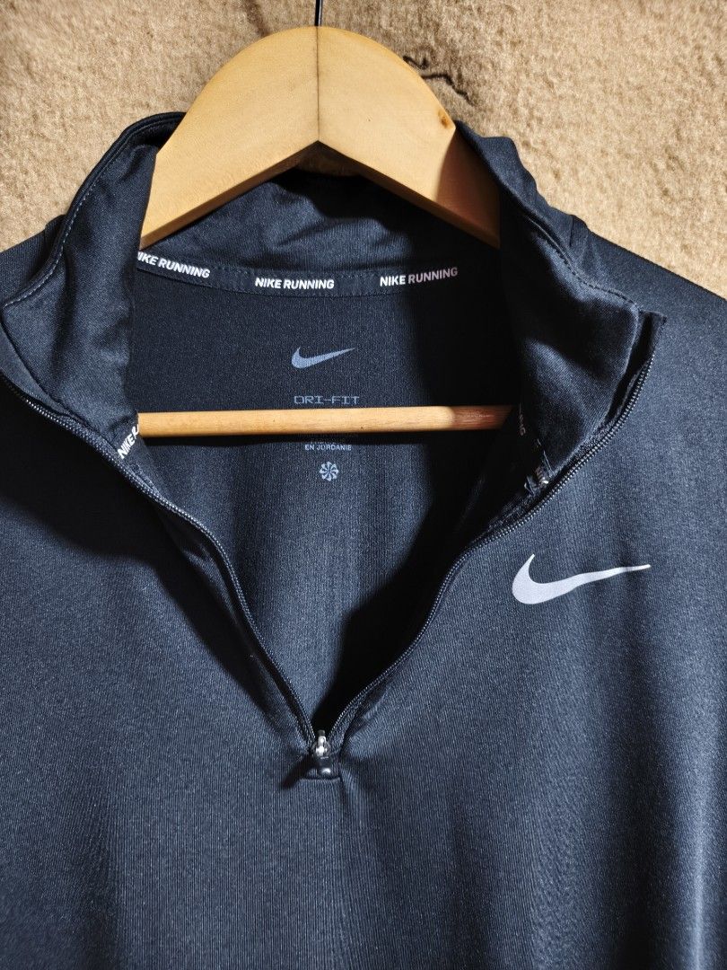 black Nike Dri-FIT half-zip running pullover, Lenght 24.5", Width 19" (Category: Activewear) located in Camalaniugan. Submitted by thrifter10 (Listing ID 1465888931, Image 3). Description: .
