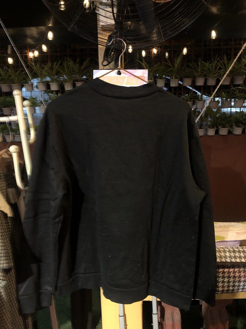 Black Retrospective Motorcycle Graphic Sweatshirt (Category: Coats, Jackets and Outerwear) located in Cauayan City . Submitted by wholly.craaaft (Listing ID 1465875361, Image 3). Description: - Color: Black with solid black back - Design: Blue motorcycle graphic with checkered flags and inspiring typography on the front - Style: Crewneck sweatshirt with long sleeves - Details: Ribbed collar, cuffs, and hem for a snug fit - Perfect for casual stre