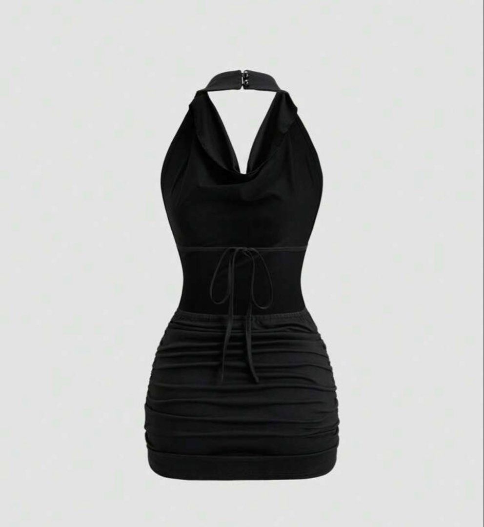 Black Ruched Halter Neck Mini Dress (Category: Dresses) located in Bulacan. Submitted by mersain (Listing ID 1465945353, Image 2). Description: - Color: Black - Style: Mini dress with halter neck and cowl neckline - Details: Fully ruched body with secure back clasp closure at the neck - Fit: Body-hugging with comfortable stretch - Condition: Clean and ready to wear - Perfect for: Going out and night outs.