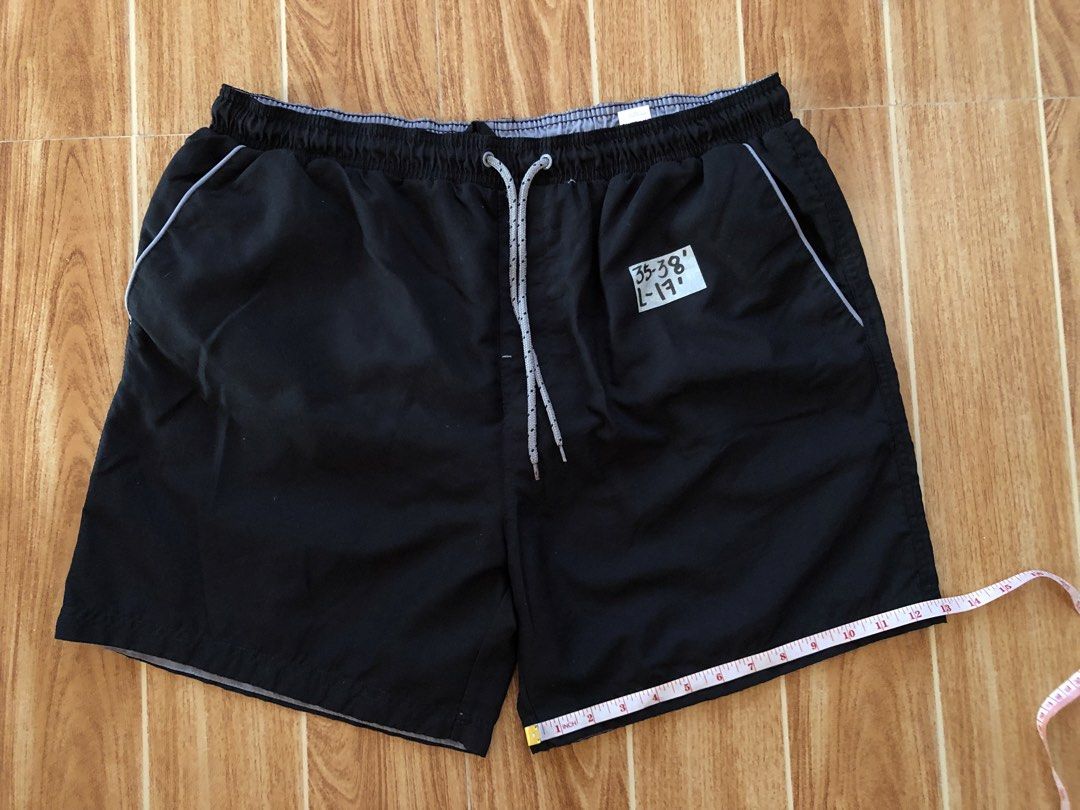 Black Swim Shorts (Category: Swim Trunks & Board Shorts) located in Tarlac. Submitted by f8njcgvfqy90581 (Listing ID 1465899789, Image 1). Description: - Color: Classic black - Size: L (fits roughly 35 to 38-inch waist) - Waistband: Elasticated with an adjustable grey drawstring - Lining: Built-in white mesh for extra comfort - Pockets: Convenient side pockets and one back pocket with a secure loop detail.