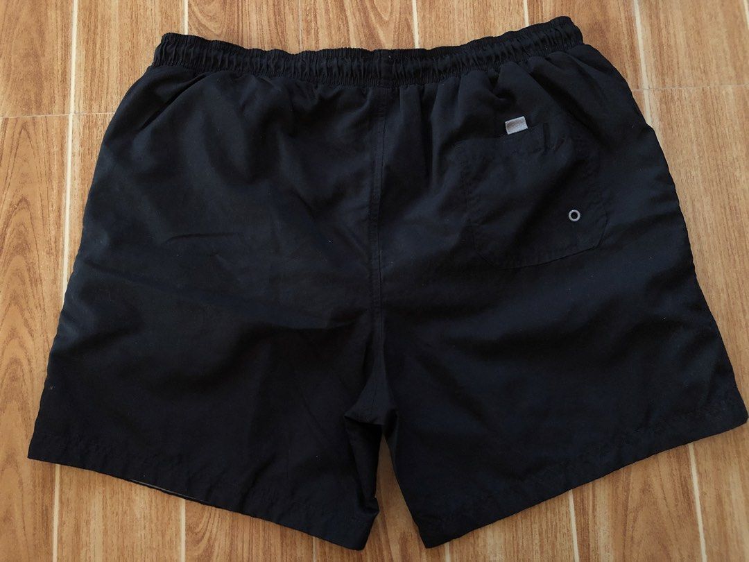 Black Swim Shorts (Category: Swim Trunks & Board Shorts) located in Tarlac. Submitted by f8njcgvfqy90581 (Listing ID 1465899789, Image 2). Description: - Color: Classic black - Size: L (fits roughly 35 to 38-inch waist) - Waistband: Elasticated with an adjustable grey drawstring - Lining: Built-in white mesh for extra comfort - Pockets: Convenient side pockets and one back pocket with a secure loop detail.