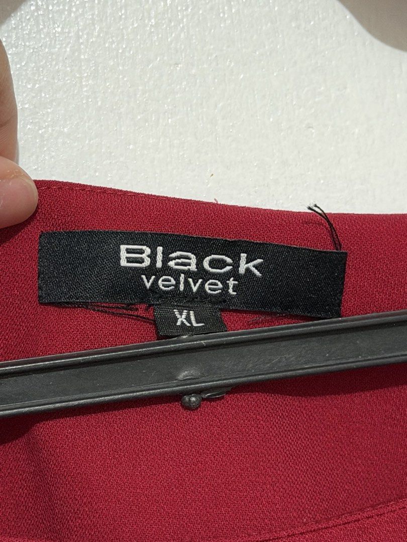 Black Velvet Deep Red Blouse XL (Category: Blouses) located in Las Pinas. Submitted by milkydeclutter (Listing ID 1465939504, Image 2). Description: - Brand: Black Velvet - Size: XL - Color: Red - Style: Short-sleeve blouse with a boat neckline and relaxed fit - Condition: Great staple piece - Versatility: Perfect for casual days or office wear, easy to pair with jeans or skirts Used once only for bar exam. This is a lucky top..