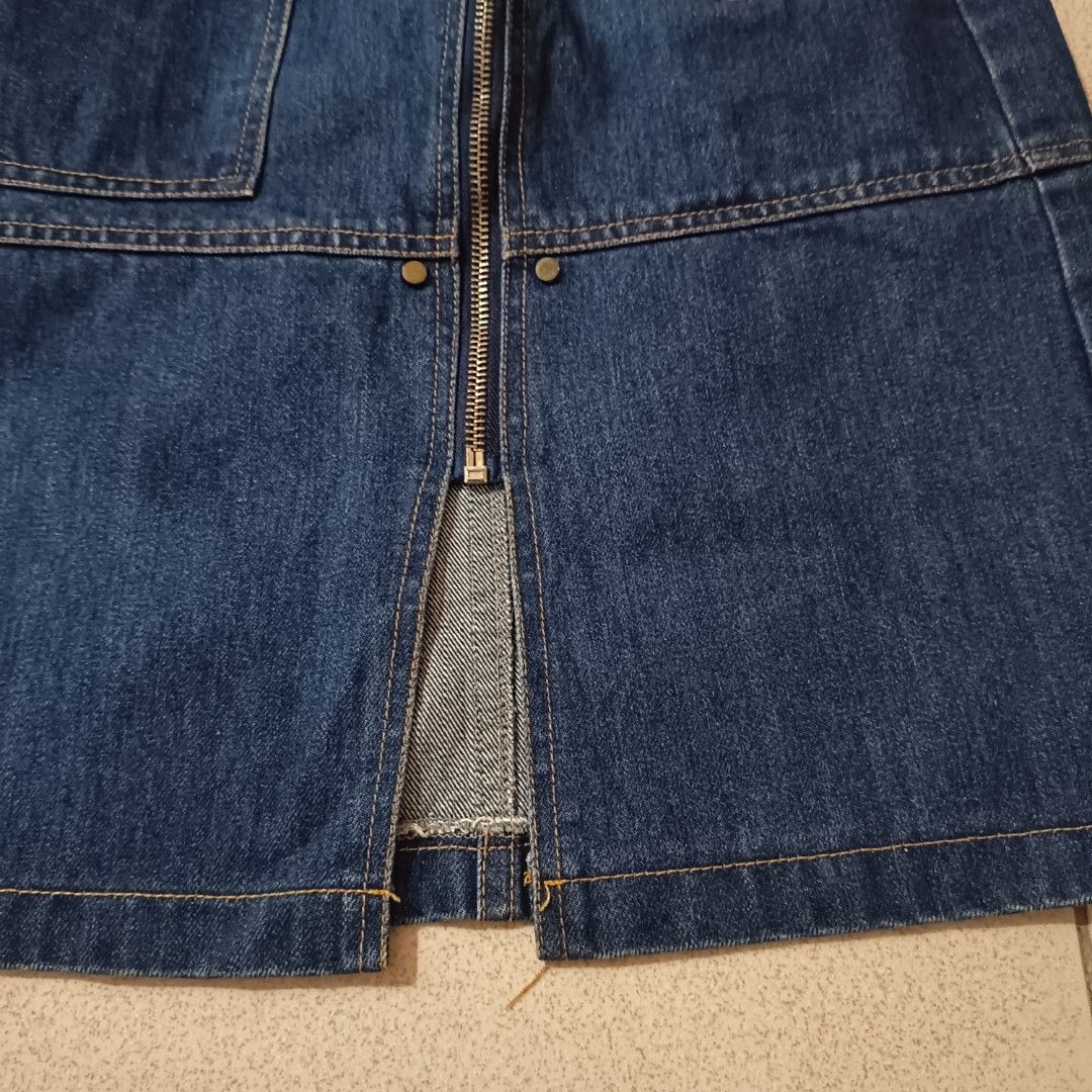 Blue Denim Midi Skirt with Front Zip and Pockets (Category: Skirts) located in Adams. Submitted by luckygirl.closet (Listing ID 1465950650, Image 3). Description: s like new with front slit .