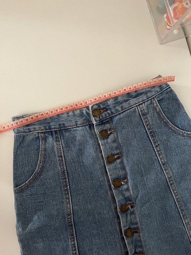 Blue Denim Mini Skirt Button Up (Category: Skirts) located in Cavite. Submitted by ysieunz (Listing ID 1465836213, Image 3). Description: disclaimer: all clothes are preloved but still in good-as-new condition and were only used 1–2 times. the color may vary due to lighting, but all details will be stated in the description. 📍 General Trias, Cavite 💰 GCash/Maya 🚚 JNT/SDD/Meet Up.