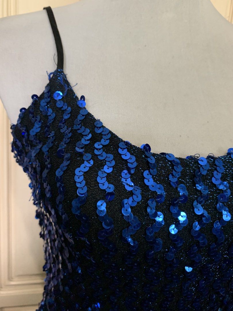 Blue Sequin Bodycon Mini Dress (Category: Dresses) located in Quezon City. Submitted by clothingline4sale (Listing ID 1465856545, Image 2). Description: Blue Shimmering Party Dress Very good condition Brand new with plastic tag Stretchable / strap not adjustable Size: small- medium Bust: 34-38” ; Waist: 30-34” ; Length: 34” Very nice in actual .