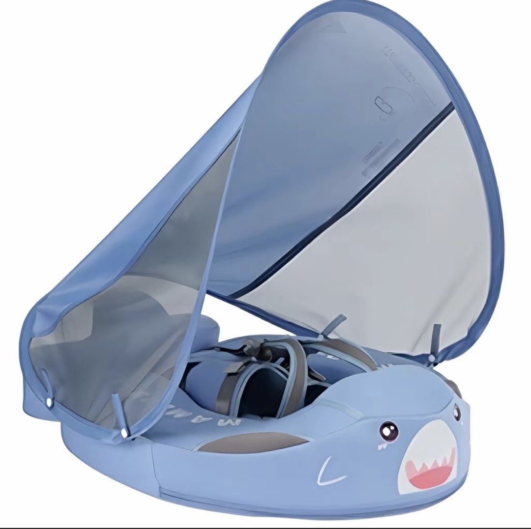 Blue Shark Baby Swim Float with Canopy (Category: Babies & Kids Fashion) located in Manila. Submitted by mommyjienna (Listing ID 1465827642, Image 1). Description: - Adorable blue shark design with friendly eyes and teeth - Removable sun canopy protects baby from harsh UV rays - Built-in safety harness keeps infants secure in the water - Ideal for fun days at the pool or beach trips.