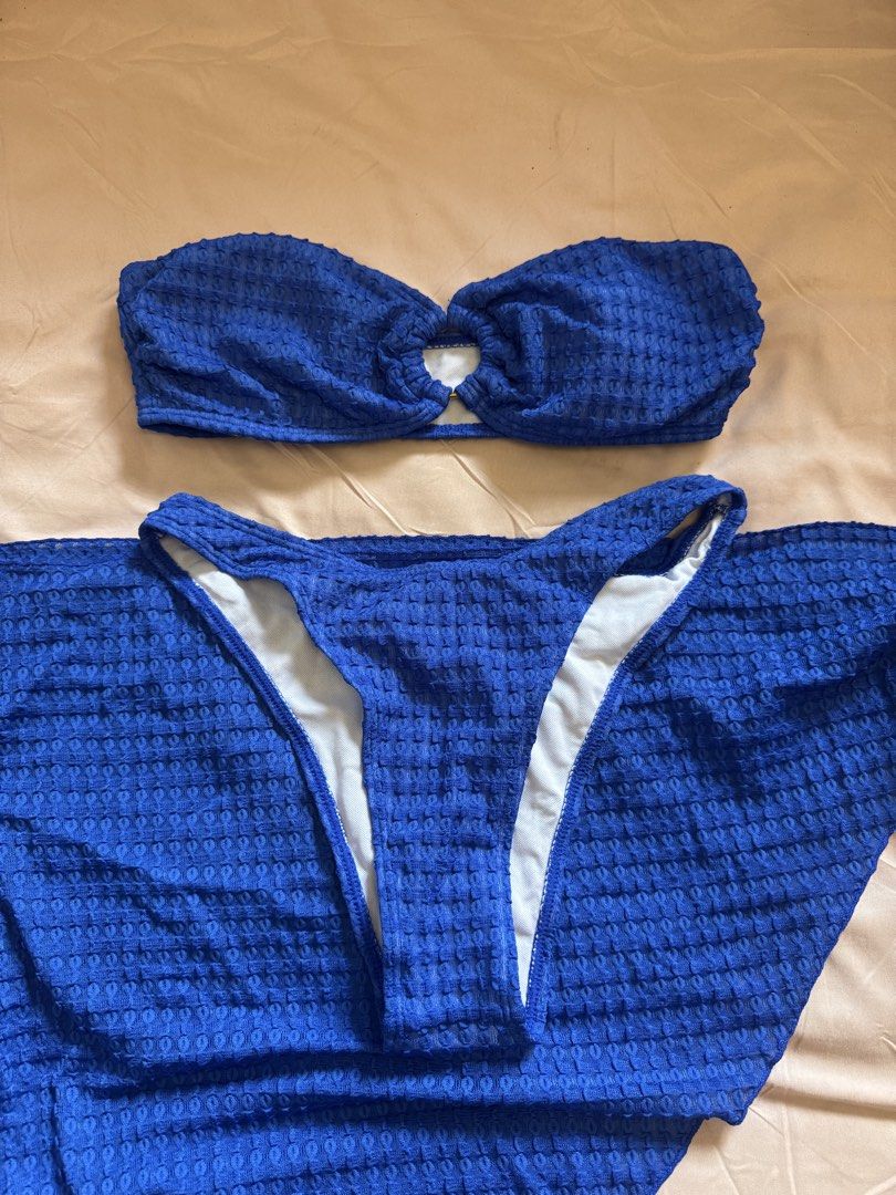 Blue textured strapless bikini set with matching wrap skirt (Category: Bikinis & Swimsuits) located in Dasmarinas. Submitted by pixiesell (Listing ID 1465784645, Image 2). Description: 3-piece set: bandeau top, bottoms, and wrap-around skirt Size: Small - medium Used only once. .