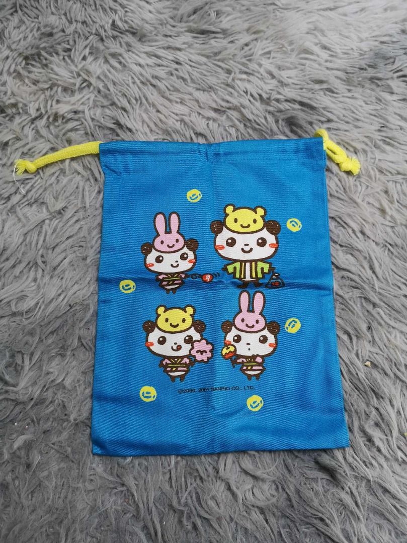 Blue With Yellow String Pouch (Category: Purses & Pouches) located in Santa Cruz. Submitted by jmy_surplus.2 (Listing ID 1465896583, Image 3). Description: Size ; L - 10.3 W - 8 Color ; Blue Type ; Pouch Brand ; No brand Material ; Nylon Style ; Drawstring Blue Printed Design Pouch LR 129 JMY 5 Batch #224.