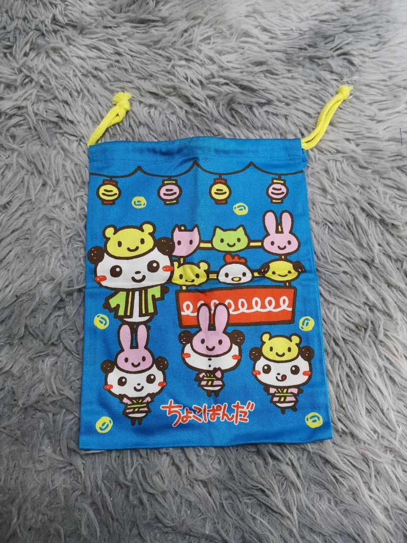 Blue With Yellow String Pouch (Category: Purses & Pouches) located in Santa Cruz. Submitted by jmy_surplus.2 (Listing ID 1465896583, Image 1). Description: Size ; L - 10.3 W - 8 Color ; Blue Type ; Pouch Brand ; No brand Material ; Nylon Style ; Drawstring Blue Printed Design Pouch LR 129 JMY 5 Batch #224.