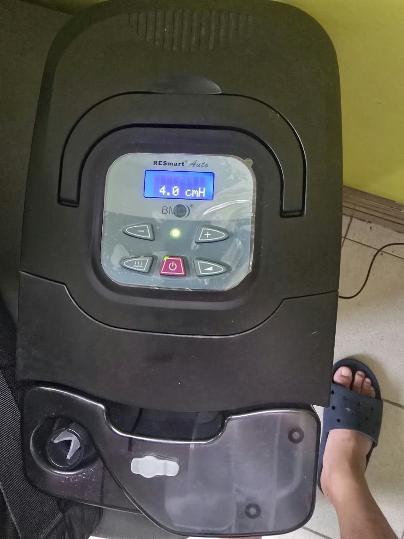 BMC RESmart Auto CPAP System with Heated Humidifier (Category: Medical Supplies & Tools) located in Pasig City. Submitted by freecrystal_dce92f (Listing ID 1465917364, Image 1). Description: - Brand/Model: BMC RESmart Auto CPAP System (Model CTX12101883) - Condition: Powers on with clear digital pressure settings display - Included: InH2 Heated Humidifier, tubing, user manual, and carry bag - Power: AC 100-240V operation - Ready for use and well-