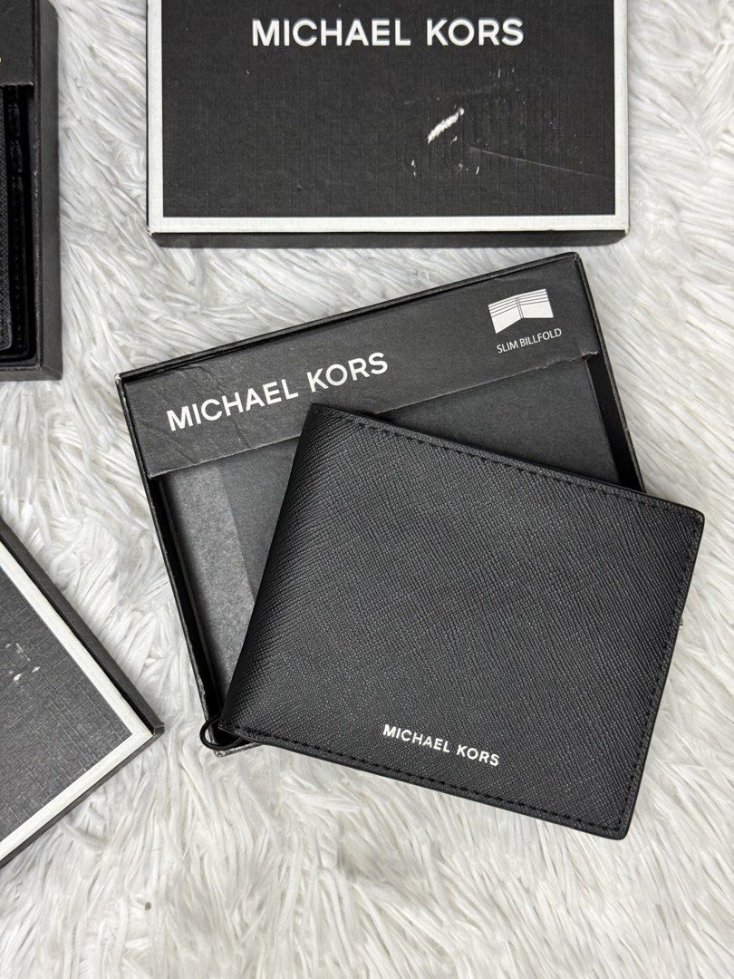 BNEW-ORIGINAL MICHAEL KORS Bi-fold Wallet (Category: Wallets & Card Holders) located in Imus. Submitted by kcnvy.co (Listing ID 1465825927, Image 1). Description: Please make an offer..