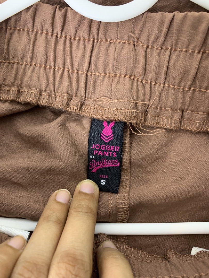 Bny Jeans Brown Jogger Pants Size S (Category: Other Bottoms) located in San Pedro. Submitted by reginacarla (Listing ID 1465791106, Image 3). Description: - Brand: BNY Jeans - Color: Brown - Size: Small - Waist: Elastic with matching drawstring - Pockets: Two functional front pockets - Style: Casual and easy to pair with any top - Comfort: Lightweight fabric ideal for daily wear.