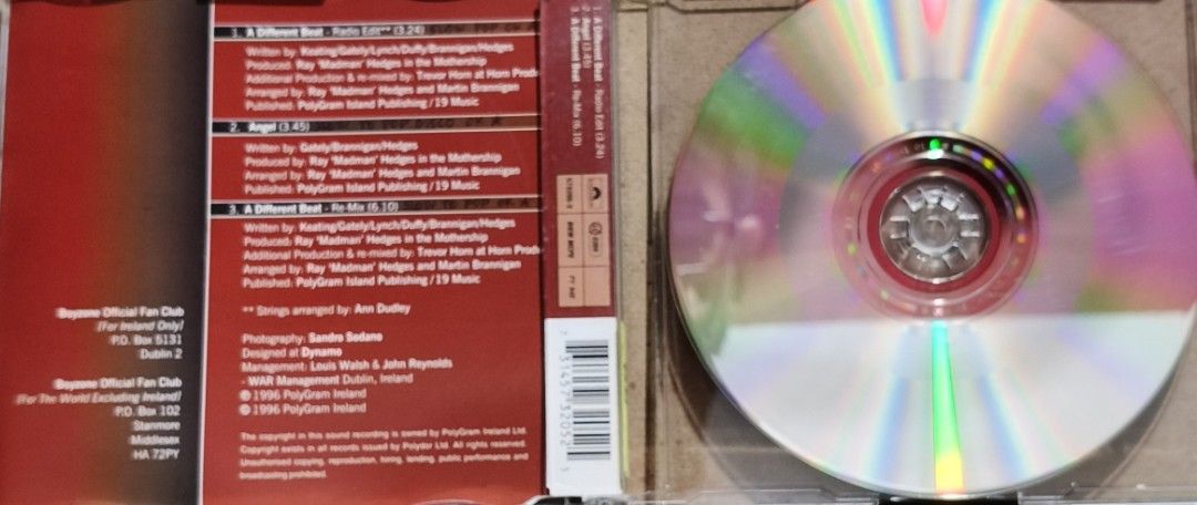 Boyzone A Different Beat CD Album (Category: CDs & DVDs) located in Manila. Submitted by ruelcabrer77078 (Listing ID 1465831722, Image 2). Description: - Artist/Album: Boyzone - A Different Beat - Release Year/Label: 1996, PolyGram Ireland - Format: Standard jewel case with original inlay and back cover art - Tracklist: A Different Beat (Radio Edit), Angel, A Different Beat (Remix) - Condition: Disc features some marker markings.