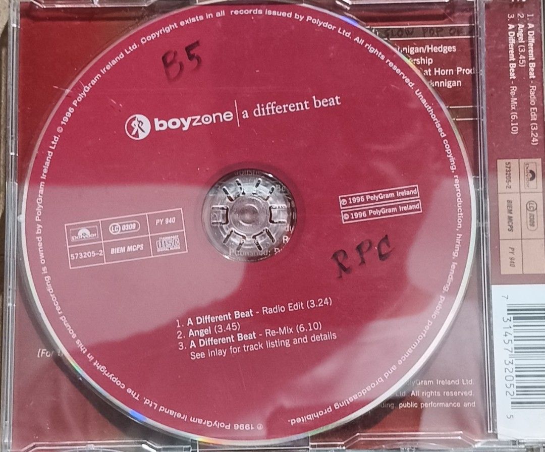 Boyzone A Different Beat CD Album (Category: CDs & DVDs) located in Manila. Submitted by ruelcabrer77078 (Listing ID 1465831722, Image 3). Description: - Artist/Album: Boyzone - A Different Beat - Release Year/Label: 1996, PolyGram Ireland - Format: Standard jewel case with original inlay and back cover art - Tracklist: A Different Beat (Radio Edit), Angel, A Different Beat (Remix) - Condition: Disc features some marker markings.