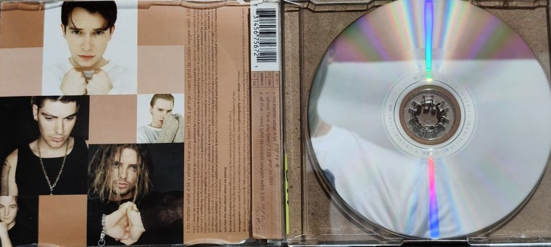 Boyzone No Matter What CD Album (Category: CDs & DVDs) located in Manila. Submitted by ruelcabrer77078 (Listing ID 1465831358, Image 2). Description: - Artist/Title: Boyzone - No Matter What CD Single - Era/Release: 1998 PolyGram Ireland release - Packaging: Standard jewel case with minor edge wear and aging - Tracks: No Matter What, Where Have You Been, All That I Need - Condition: Disc surface features handwritten markings in permanent marker.