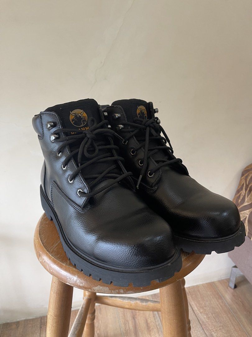 Brahma Black Work Boots Slip & Oil Resistant (Category: Boots) located in Dumaguete. Submitted by nishen079 (Listing ID 1465778320, Image 3). Description: - Brand: Brahma - Color: Classic black with matching laces and metal eyelets - Soles: Heavy-duty lug soles with slip and oil-resistant rubber for solid traction - Comfort: Padded collars around the ankles for extra support during long shifts - Durability: Reinforced stitching along the sides fo
