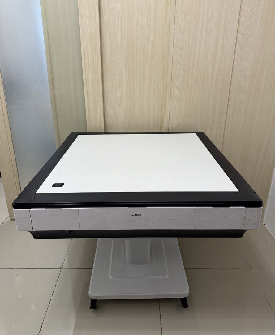 Brand new automatic mahjong table complete set (Category: Other Sports Equipment and Supplies) located in Mandaluyong City. Submitted by jenerously (Listing ID 1465802502, Image 2). Description: *Brand new foldable table *With wooden cover *144 2 sets of tiles (blue and green) *Complete compartments *Pick up or bank transfer upon delivery *Mandaluyong location near mrt boni.