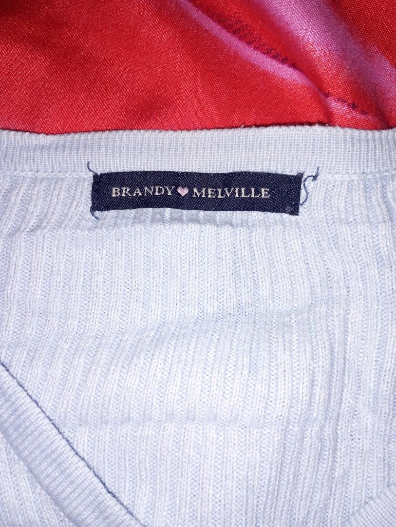 Brandy Melville Light Blue Cardigan (Category: Coats, Jackets and Outerwear) located in Quezon City. Submitted by awhdri (Listing ID 1465773746, Image 3). Description: - Brand: Brandy Melville - Style: Light blue ribbed cardigan with V-neck and front buttons - Fit: Cropped length with long sleeves - Material: Soft and lightweight knit fabric - Size: S-M .