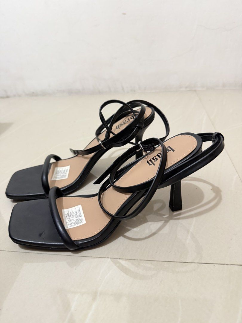 Brash Black Strappy Heels Size 6.5 (Category: Heels) located in Taguig. Submitted by paucsn (Listing ID 1465945050, Image 2). Description: - Brand: Brash - Size: 6.5 - Color: Black with tan inner sole - Style: Strappy heels with square toe and stiletto heel - Details: Thin wrap-around ankle straps - Condition: Minor scuffs on the sole from storage/handling RFS: Di na nagagamit Can do meet up within Market Market Bgc Ship via lalamove/lbc.