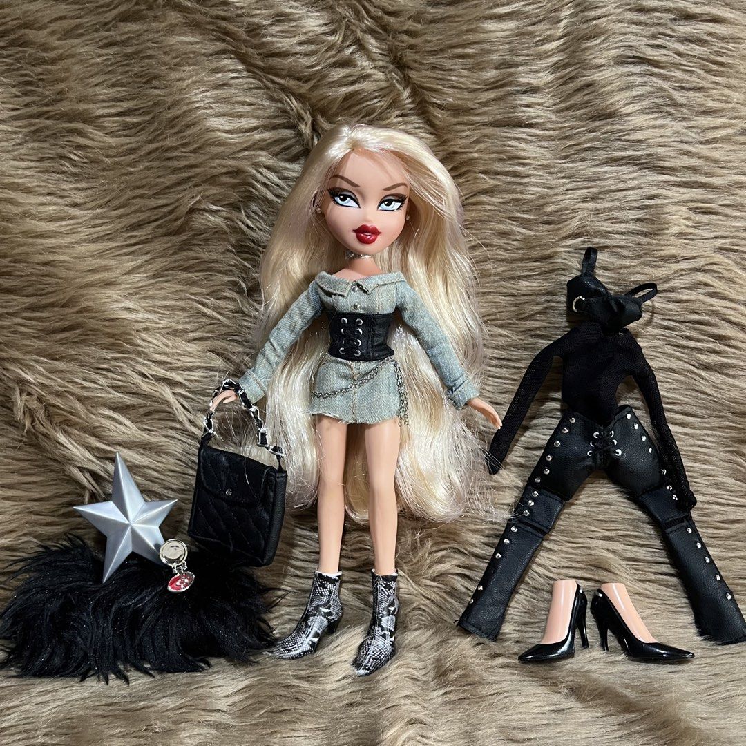 Bratz Hayden Williams Collector Cloe Doll (Category: Kids Toys) located in Cebu City. Submitted by jayrassicpark (Listing ID 1465910077, Image 1). Description: Bratz Collector doll Cloe from the Bratz Hayden Williams collection with accessories for sale for only ₱17,000 Details: -1 preloved Bratz doll (Cloe - out of the box, on hand) -Doll is still in great condition (hair is soft, articulation is alright) -Issues: missing hat, faux leather shows