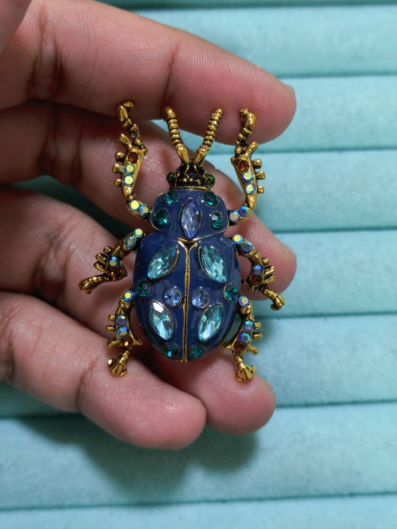 Brooch Pin Blue Beetle (Category: Brooches) located in Taguig. Submitted by jeannescarlet (Listing ID 1465792196, Image 1). Description: 💎Brand New 💎Alloy Material.