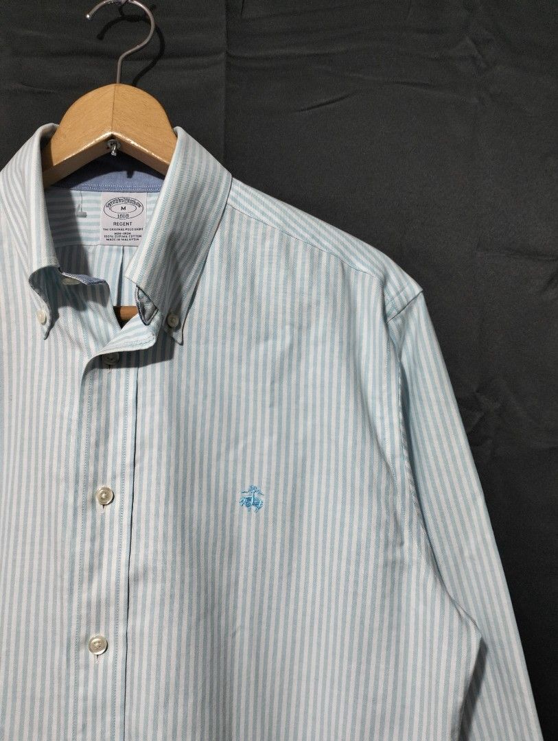 Brooks Brother Pinstriped Buttondown For Men (Category: Formal Shirts) located in Lapu Lapu. Submitted by kalyengkalat01 (Listing ID 1465889551, Image 2). Description: Brooks Brother Pinstriped Buttondown Longsleeve For Men — Regent Fit , Oxford Cotton Size : Medium Dimes : 21.5 Width 29 Length Color rate : 9.8 out of 10 —————————— Authentic | Legit 💯 Condition : Like New / Excellent ‼️ ISSUE : NONE 🚶‍♂️ Washed & Ready to Wear.