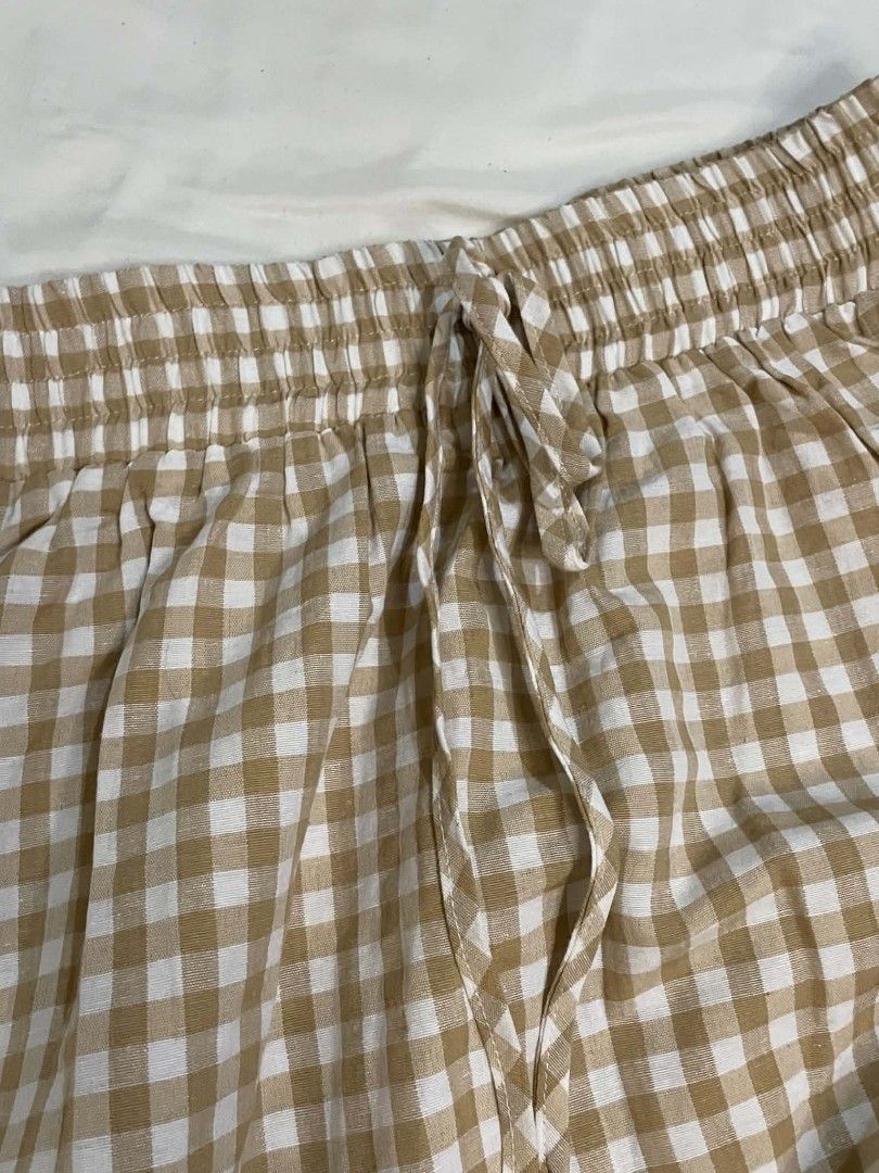 Brown Gingham Long Skirt (Category: Skirts) located in Binan City. Submitted by declutterbyjwy (Listing ID 1465949004, Image 2). Description: waist: 25-28 | length: 36" - drawstring is not adjustable - I'm 5'1 and hanggang ankle ko siya - It's brandnew, I just washed it and removed the hangtag. - no ww but I attached inspo.