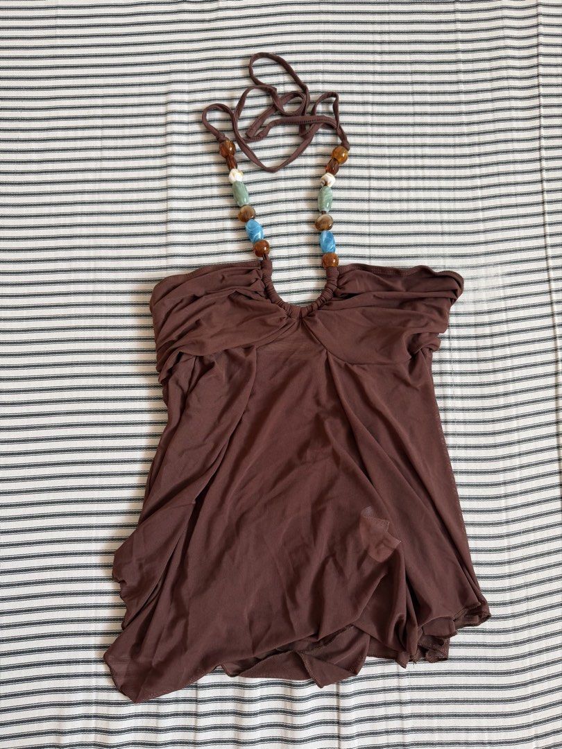 Brown Halter Top with Beaded Straps (Category: Sleeveless) located in Cavite. Submitted by chinitolover (Listing ID 1465769631, Image 1). Description: - NEVER BEEN WORN - Material: Sheer, lightweight, and soft mesh fabric with great movement - Design: Halter neck style with adjustable neck ties - Accents: Unique beaded straps featuring blue, green, and amber stones - Fit: Gathered front detail with a flattering, flowing, and draped fit - Occasion