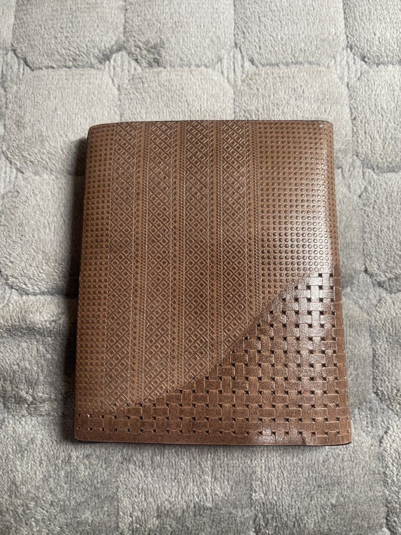 Brown Men's Bifold Leather Wallet with ID Windows (Category: Wallets & Card Holders) located in Quezon City. Submitted by donnabelle7572 (Listing ID 1465937246, Image 2). Description: - Material: Premium brown leather with a mixed woven and textured exterior panel design - Interior Layout: Multiple card slots, slip pockets, ID windows, and a spacious cash compartment - Lining: Clean interior lining featuring a visible branding stamp - Usage: Perf