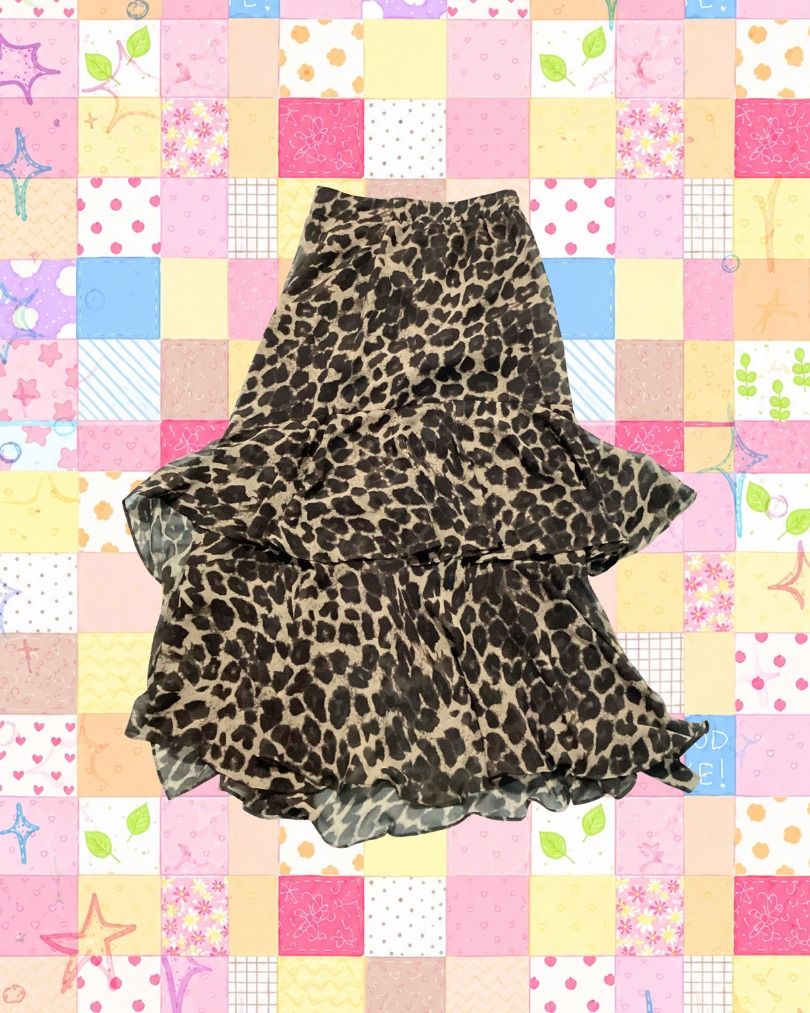 brown ruffled leopard print skirt (Category: Skirts) located in Cavite. Submitted by funnyvalentine (Listing ID 1465935058, Image 1). Description: ♡ condition : 10/10 ♡ like new, no issue ♡ W: 23-26 ♡ L: 32 inches.