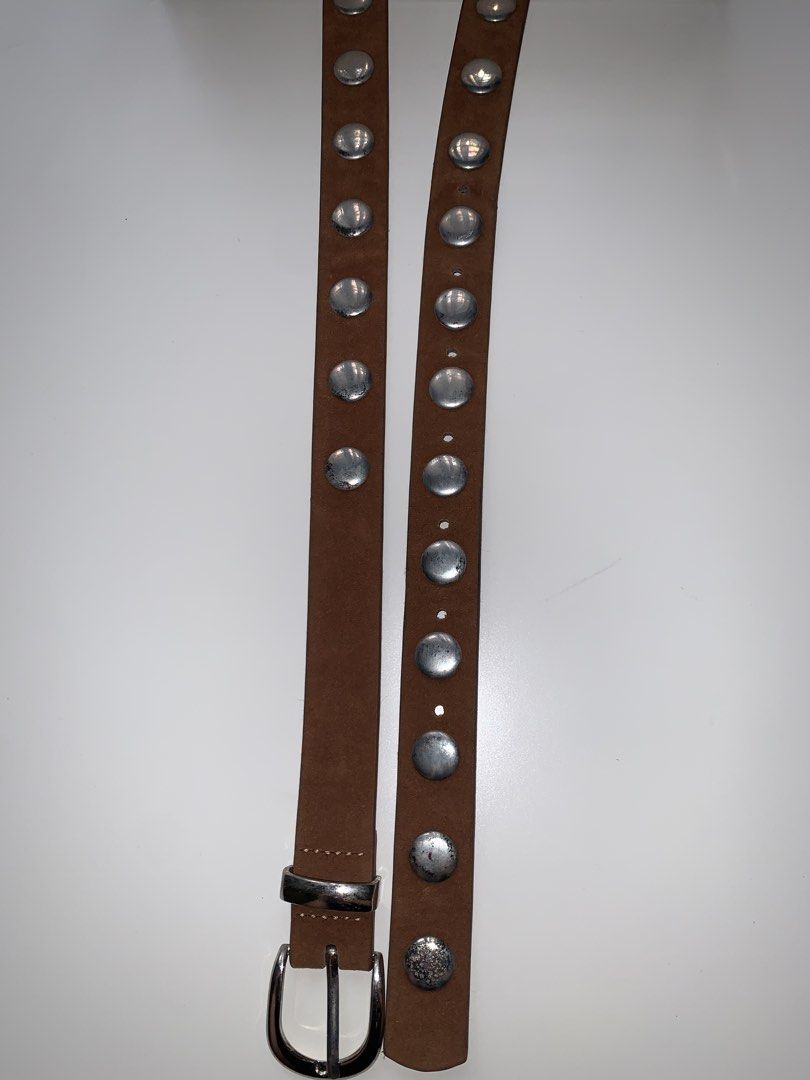 Brown Suede Studded Belt with Silver Hardware (Category: Belts) located in Taguig. Submitted by kxtrxnxxxx (Listing ID 1465832381, Image 3). Description: - RFS: Not using it anymore/Never used - NO photo when worn - Length: 47inches / 119cm - Width: 1 inch - 7 belt holes ‼️‼️ READ FIRST ‼️‼️ 📦 Delivery within Metro Manila ONLY ⏰ 24-hour reservation only. ❌ NO Orange app checkout ❌ NO Meetups 💵 MOP: GCash, BDO and Unionbank ONLY 📦 Delivery with