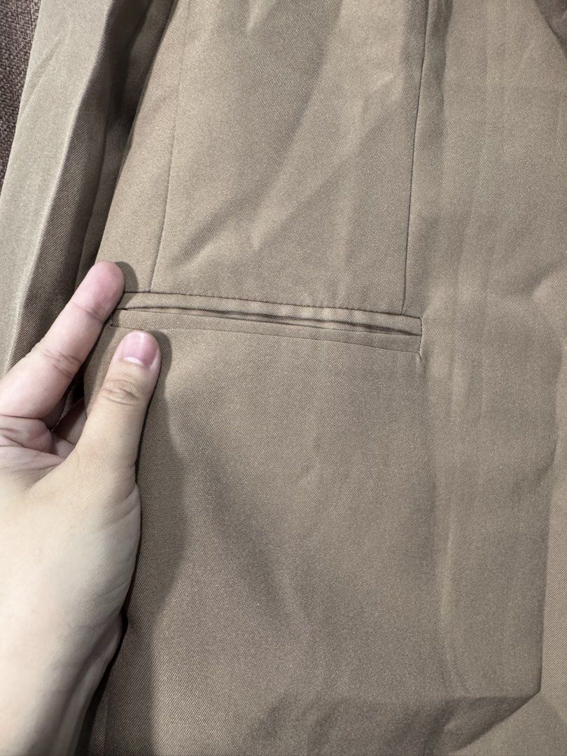 Brown Taupe Long Sleeve Button Blazer Jacket (Category: Coats, Jackets and Outerwear) located in Naga. Submitted by danisj (Listing ID 1465946962, Image 2). Description: - Color: Taupe brown - Design: Classic lapels, structured shoulders, and clean back panel seams - Closure: Two front button closure with matching fabric buttons - Pockets: Two hip flap pockets and one small chest pocket - Lining: Fully lined in a lighter tone - Fabric: Smooth, mi