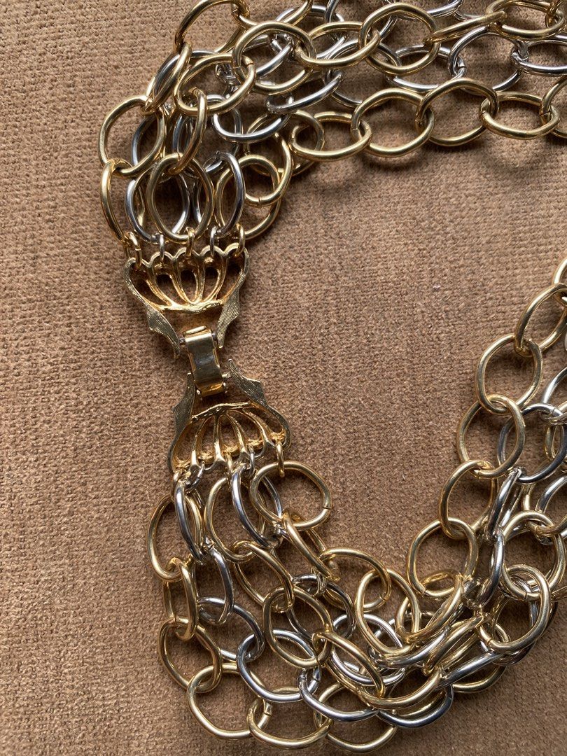 Brutalist statement necklace (Category: Necklaces) located in Cebu City. Submitted by janb85 (Listing ID 1465849595, Image 3). Description: A multi-strand, mixed-metal chunky chain necklace featuring interlinked oval loops in alternating gold and silver tones. A perfect edgy piece that allows you to mix your metals for a statement look..