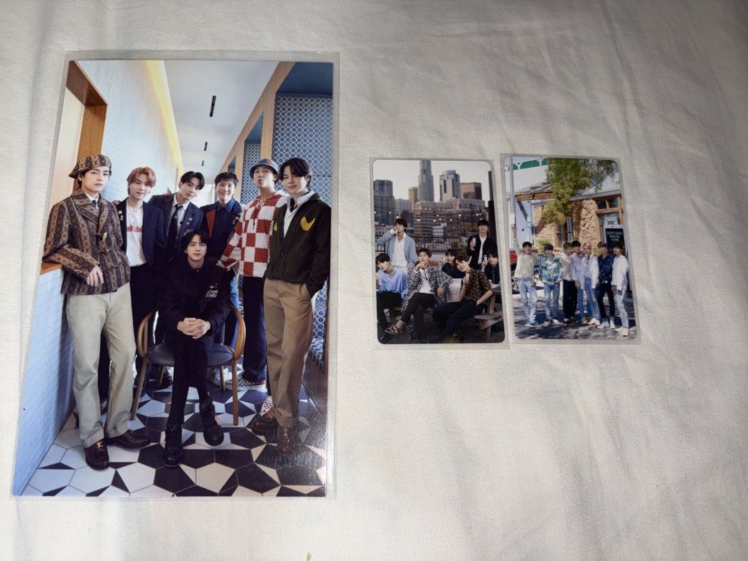 BTS Photocard Set Group Picture Dicon 101 (Category: K-Wave Merchandise) located in San Fernando. Submitted by h.obi (Listing ID 1465790500, Image 1). Description: - Official BTS group merchandise - Includes 1 large vertical postcard and 2 smaller photocards - Features all 7 members with cool urban backgrounds - Clean edges with no bends or folds - Clear protective sleeves included for safety.