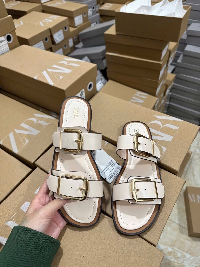 Buckle Flat Sandals (Category: Flats & Sandals) located in Manila. Submitted by aiman_sole5 (Listing ID 1465839317, Image 1). Description: cream or brown? 🤎🤍 honestly… both 😭 the kind of sandals you can literally throw on and still look put together ✨ ₱1,085 only - with box and paperbag Available size: 35. 36. 37. 38. 39. 40 📍 Imus, Cavite - Lalamove available (same day delivery) - JNT shipping available.