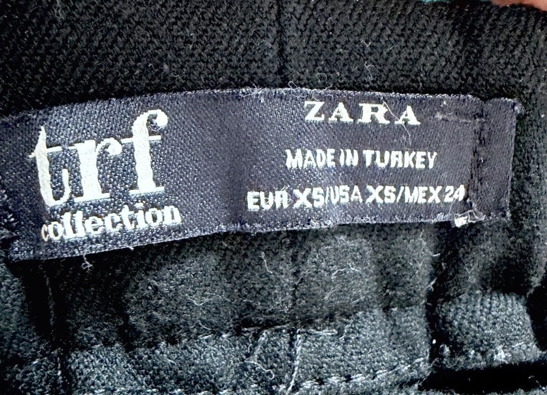 BUNDLE OF 2 Zara TRF Trouser Pants (Category: Jeans) located in San Fernando. Submitted by lovepreloved13 (Listing ID 1465836741, Image 3). Description: - Brand: Zara TRF Collection - Quantity: Bundle of 2 pairs - Colors & Sizes: Dark Green (Size S) & Classic Black (Size XS) - Features: Soft textured material with functional side pockets - Style: Versatile basics, great for casual wear or work outfits.