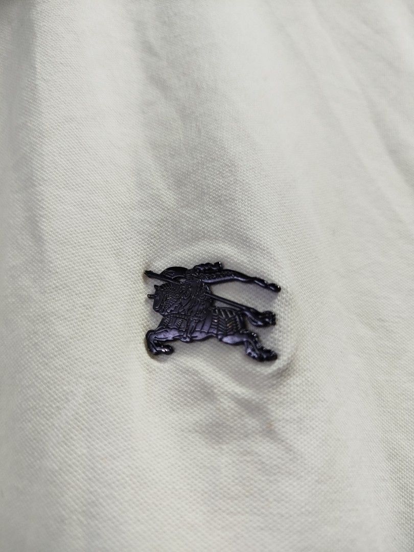 BURBERRY WHITE POLO SHIRT (Category: Tshirts & Polo Shirts ) located in Bayombong. Submitted by Gentlemans_ClosEt (Listing ID 1465792535, Image 3). Description: BAPE WHITE POLO SHIRT BEST FIT SIZE MEDIUM DIMES: W20.5 X L27 9.8/10 COLOR RATE EXCELLENT CONDITION NO ISSUES.