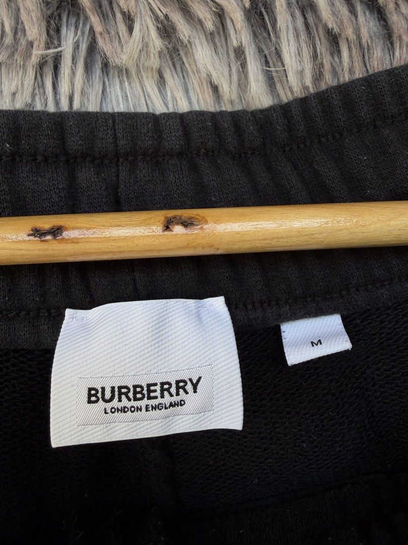 Burberry Ghost Patch Black Sweatshorts Size M (Category: Shorts) located in Bacong. Submitted by kristalays (Listing ID 1465910718, Image 3). Description: - Brand: Burberry - 31-36’ waist, 20.5’ length, 13’ leg hole - Excellent condition - No issues - Color: Black - Size: Medium - Authenticity: Made in China, Code 8051925 on inner tag.