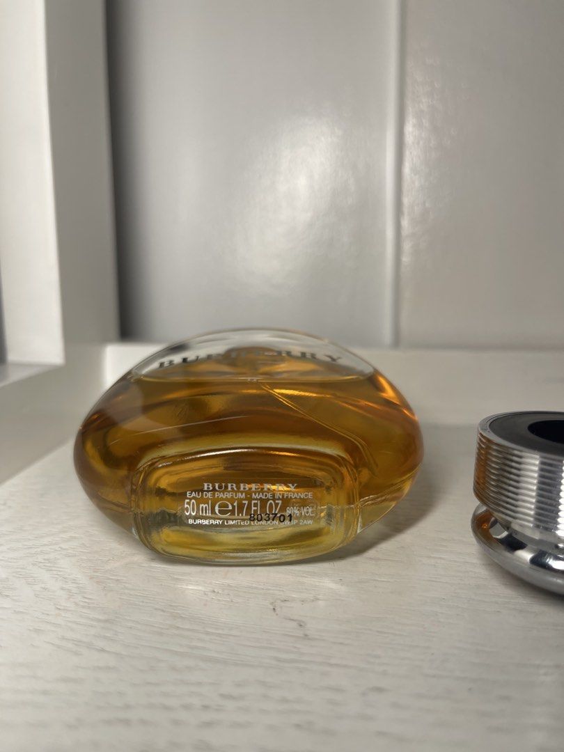 Burberry Women Eau de Parfum 50ml (Category: Fragrance & Deodorants) located in Mandaluyong City. Submitted by manilasyoungstunna (Listing ID 1465915052, Image 3). Description: Selling really low RFS: scent is not my type authentic price negotiable - Brand: Burberry Women Eau de Parfum - Size: 50ml bottle - Volume: Approx. 80% remaining - Origin: Made in France (Batch code: 803701) - Design: Signature rounded glass flacon with heavy metal cap - P