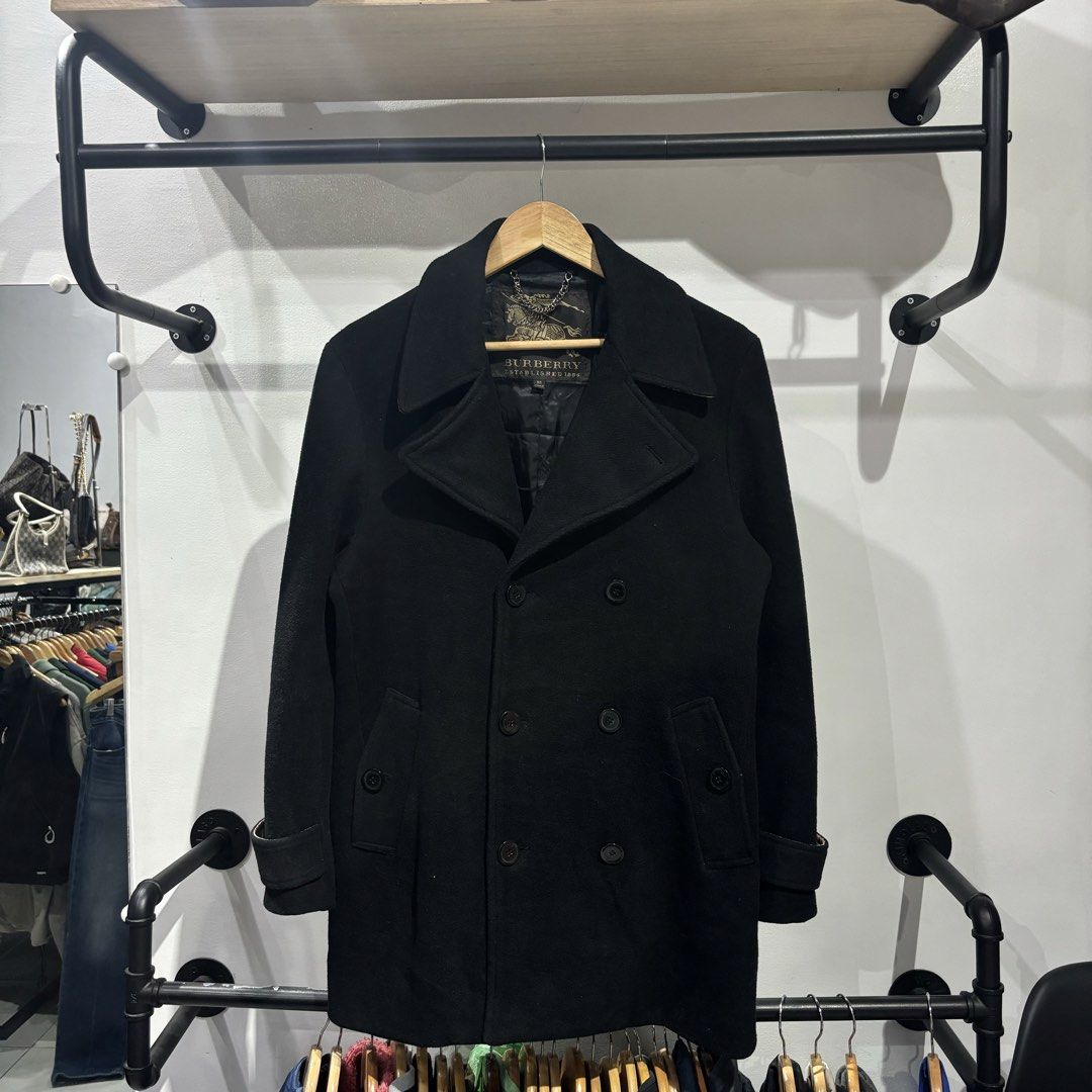 Burberry Wool Trench Coat (Category: Coats, Jackets and Outerwear) located in Bambang. Submitted by heats777 (Listing ID 1465854091, Image 2). Description: Excellent condition No issue Size: 50 on tag.